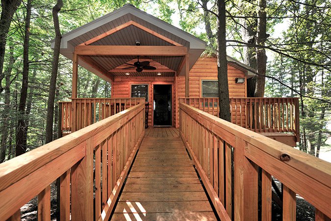 At Country Roads tree houses, guests enter on bridges.