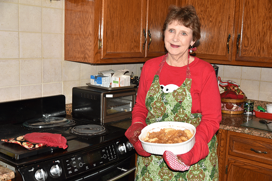 Elaine preparing to serve Arkansas Black Cobbler.