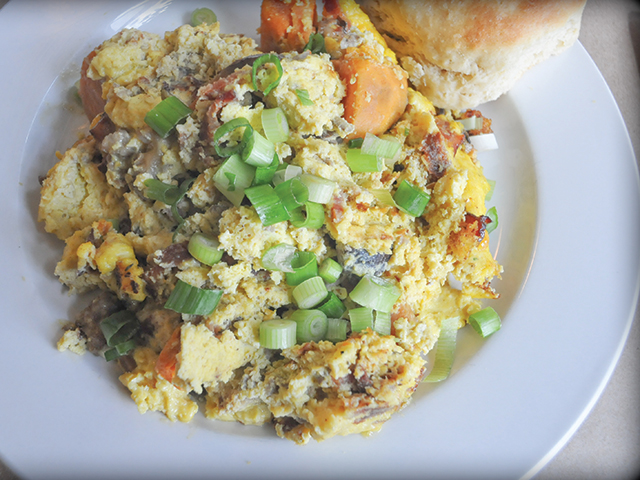 The origins of Early Girl’s sweet potato scramble: leftovers that had gotten a little too “mushy,” and bacon and sausage that happened to be around that day.