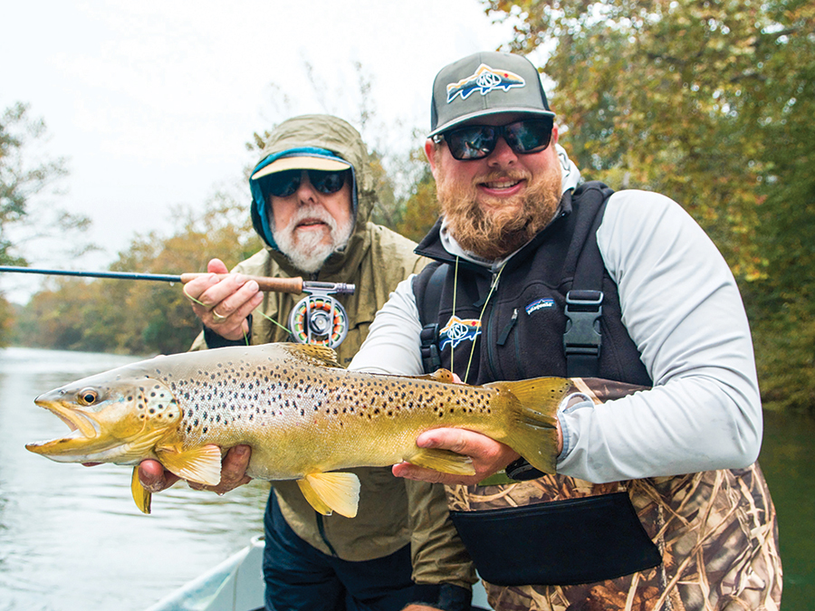 Jimmy Cheers (right) shows off a catch alongside his grandfather, Jimmy Cheers, Sr.