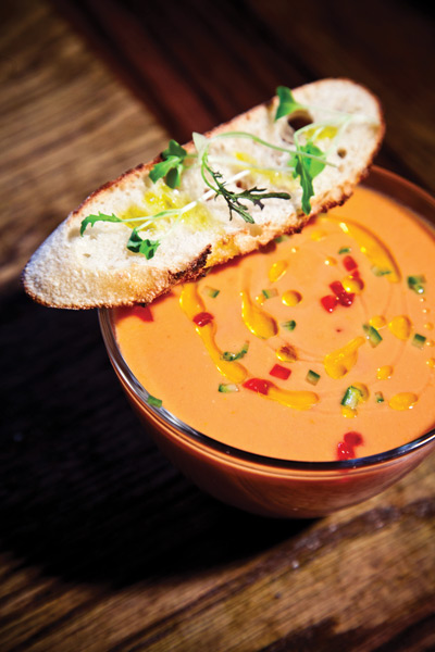 Curate’s Gazpacho is garnished with cucumber, green pepper, tomato and a drizzle of olive oil.