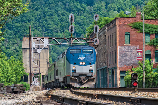 The Amtrak Cardinal pulls into tiny, historic Thurmond, West Virginia, from where travelers can arrange an exploration of the New River Gorge.