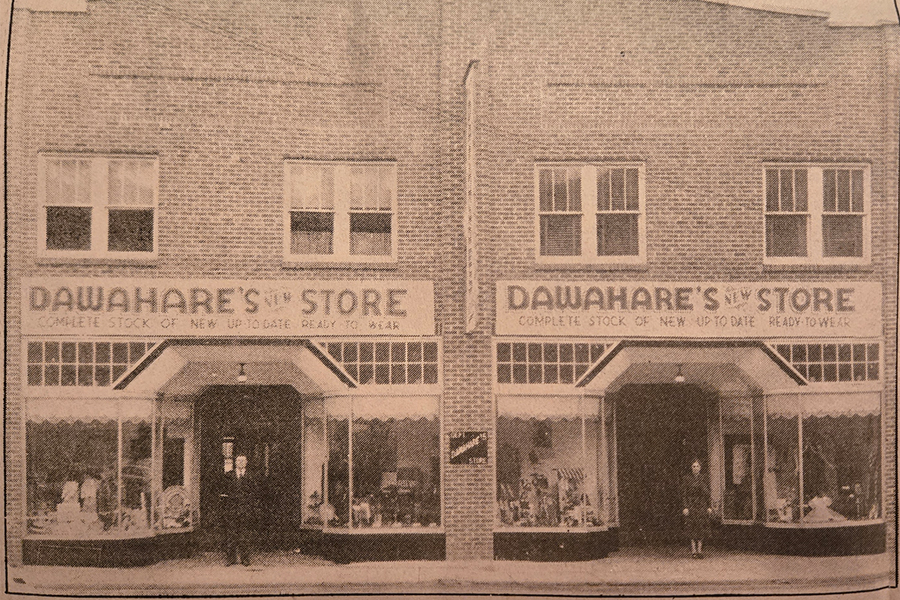 Willie and Nellie Dawahare stand outside the family’s first full-fledged department store in Neon, Kentucky.