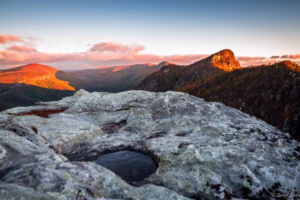 Taken at sunrise at the " chimneys" Linville gorge. According to Wikipedia the Linville Gorge Wilderness, also referred to as the Grand Canyon of North Carolina is considered to have strenuous and challenging terrain that could be difficult even for the most seasoned hikers. Because of the wilderness designation trails in the gorge are not improved or well marked like visitors are accustomed to in national or state parks. Beginners and those without land navigation training are advised to stick to shorter hiking trails, like the chimneys or table Rock.
