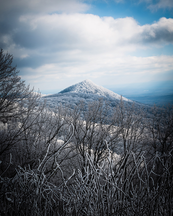This image of Sharp Top Mountain, taken from the Burnt Mountain Overlook in Pickens County, Georgia, was captured as freezing fog rolled through the higher elevations and created a coat of ice across the mountaintops. From the photographer: “I would consider this the best view in the area; so good that on a clear day you can see the city of Atlanta! In this shot you will also gaze upon the small town of Jasper, Georgia in the foreground, nicknamed ‘The First Mountain City.’”