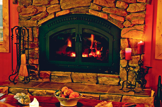 This glass-enclosed fireplace, at the Floyd, Va. home of David Fason and Diane Jackson, is energy efficient and beautiful.