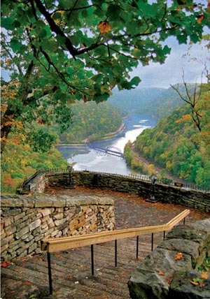 The view is of the New River from the state park; the bridge is a railroad bridge along the CSX line through the gorge.