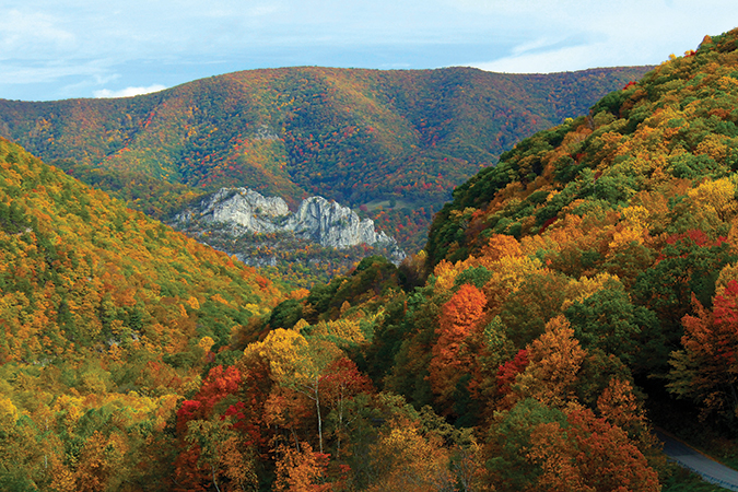 View is from Smith Mountain Road in Pendleton County, West Virginia. From the photographer: “After many years photographing Seneca Rocks from the parking area in front of the rocks I accidentally discovered this view while exploring backroads. Since then it has become one of my favorite views of Seneca Rocks...especially during autumn.”