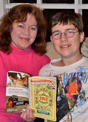 Marla Milling and son Ben, 15, leaf through the 2013 edition of “The Old Farmer’s Almanac.”