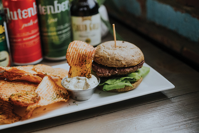 The Native Kitchen Classic Burger is made 
with pasture-raised beef and is served with house chips.