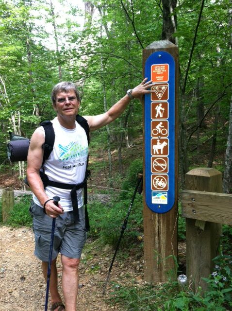 Kurt at start of walk, foolishly trying to point out that on word on the sign is spelled "Yeild."