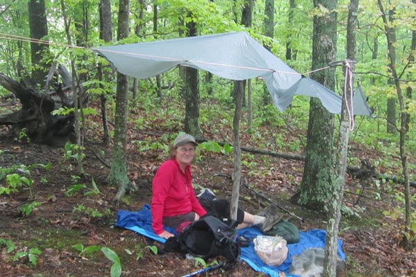 Rain ain't getting to us under this highly sophisticated set-up.