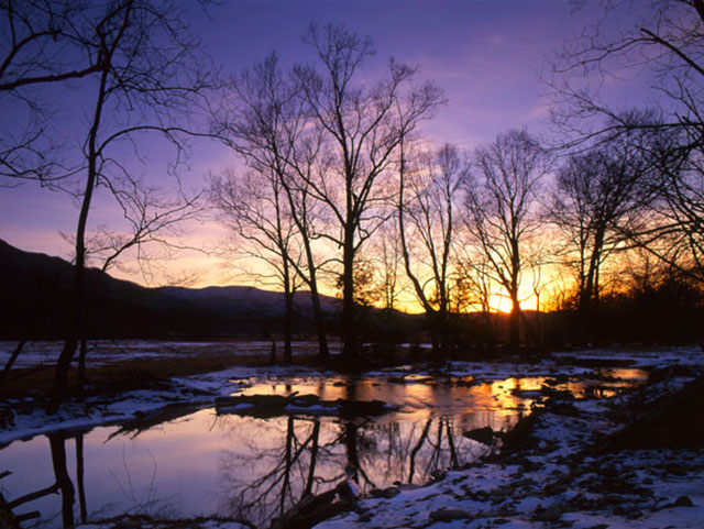 Sunset reflection at Cades Cove in Great Smoky Mountains National Park. Photographer Canada: “There are not many areas in Cades Cove that allow reflection images of the sunset; this one only works in winter since the foliage clears the view as the leftover snow helps to reflect the evening glow.”