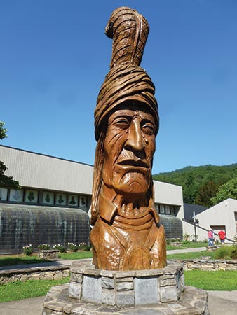 Peter Toth’s “Sequoyah” is carved out of a sequoia log—in front of the Museum of the Cherokee Indian.