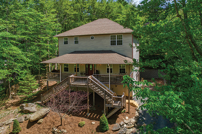 It’s easy to visualize owning a home with a beautiful mountain view. Finding one to buy at an affordable price is much trickier.