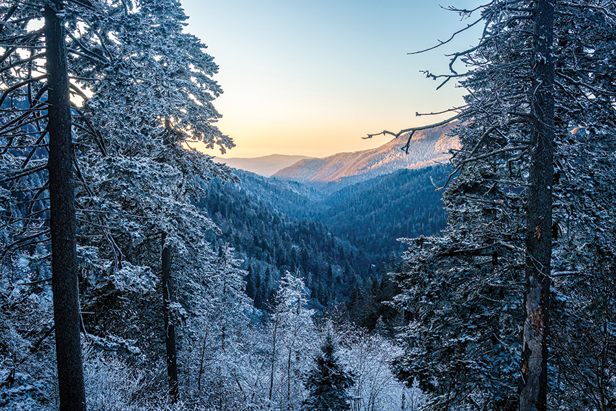 Ice-coated trees frame a frosty sunset view just below Newfound Gap on the Tennessee side of the Great Smoky Mountains near Gatlinburg.