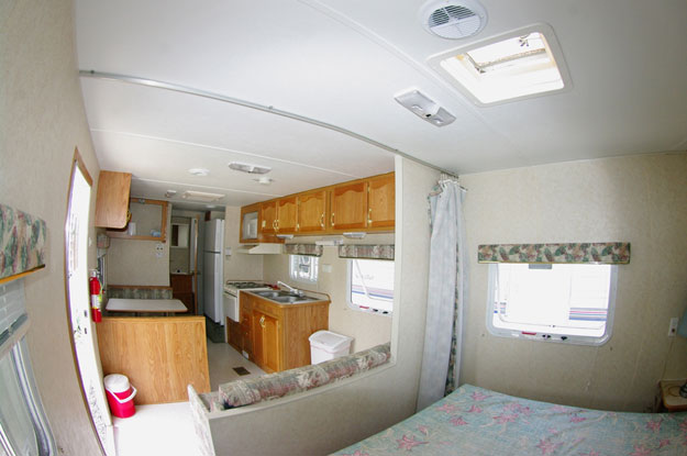 The trailer is adjacent to the refuge office and visitor center. Every day or so I fill up the holdng tank, empty the gray water, etc. I do have electricity, even polarized plugs to plug in my chargers, etc. It has been very windy and rainy -- a good thing the trailer is anchored.