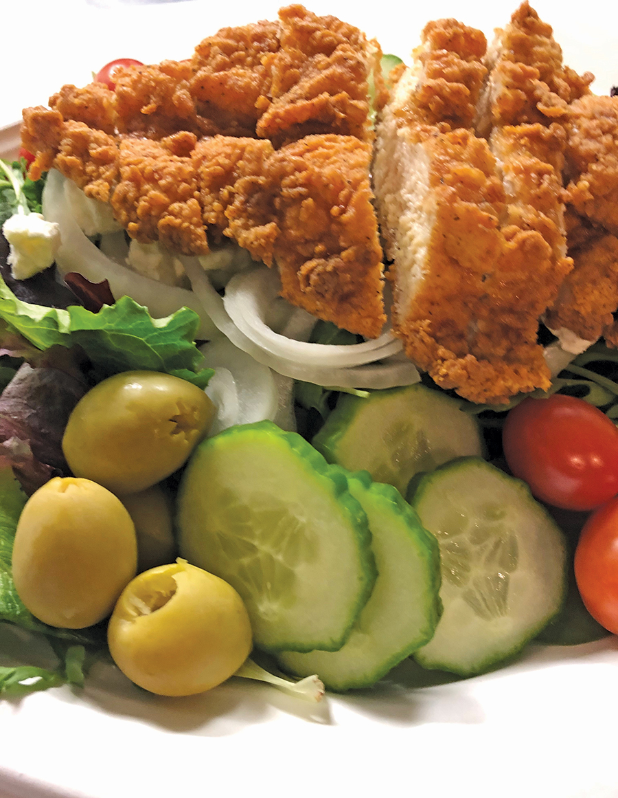 Heritage Kitchen’s Greek salad with fried chicken.