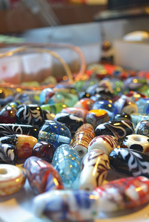 A collection of Kimberley’s lampwork beads, each a one-of-a-kind creation from the mind of the artist.