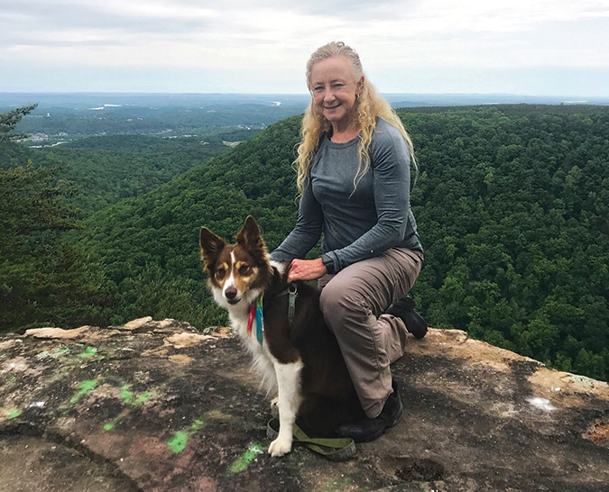 Lorye Nichols’ explorations of the Tennessee mountains usually occur with pup Skye, who has her own hiking boots.