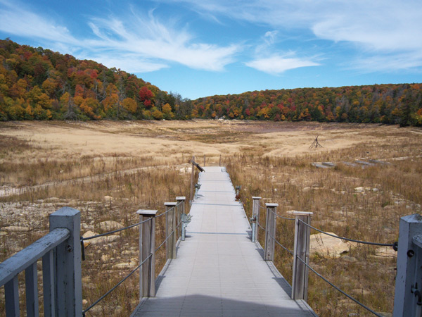 The (non-) lake at Mountain Lake in Virginia may be poised for refilling after nature-mimicking patches were applied to four holes.