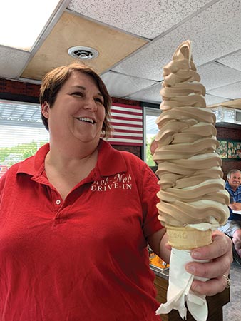 Hob-Nob manager Devonne Thacker balances a Monster Cone.