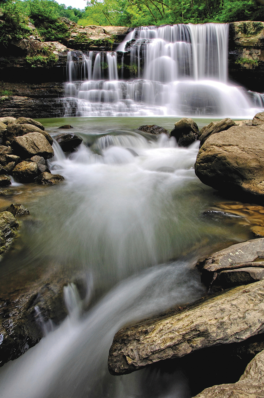 Peter’s Creek Falls, on a tributary of the Gauley River in West Virginia. From the photographer: “Getting there requires some adventure. My wife and I had to creep through a dark and spooky abandoned railroad tunnel and then cross the Gauley River on a lofty abandoned railroad trestle. It was all worth it, though, as the falls proved to be creek-wide, flowing well and very photogenic.”