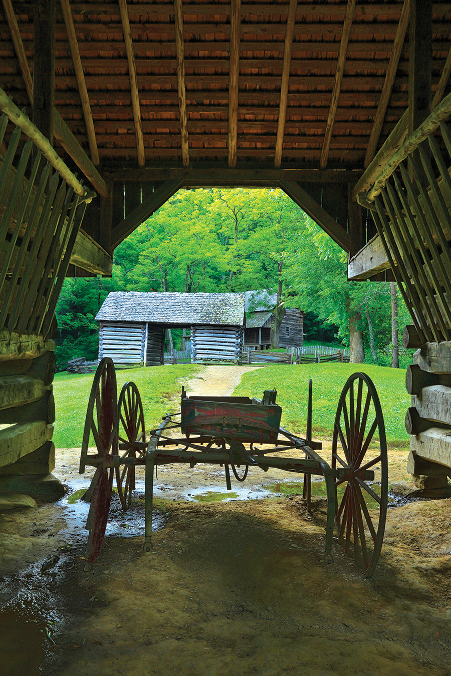 Old buggy sits in a barn on the Tipton Place Homestead, Cades Cove, Great Smoky Mountains National Park, Tennessee.