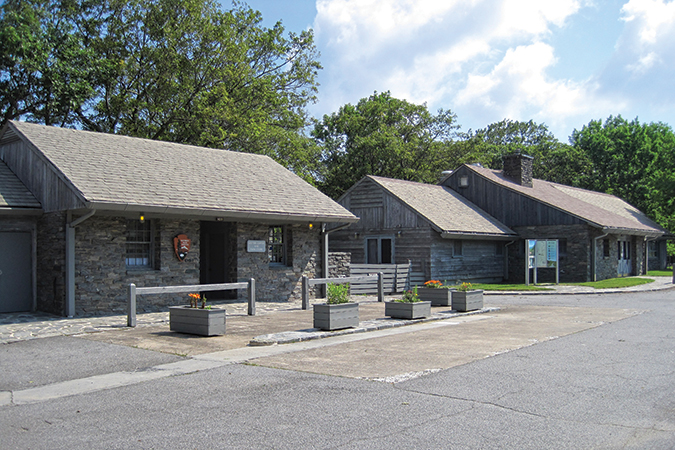 The Doughton Park concession area has an abandoned air. The visitor center, left, is closed on Tuesdays and Wednesdays, even during the season; gas pumps are long gone; fundraising efforts to re-open the Bluffs Coffee Shop, on right, are ongoing.