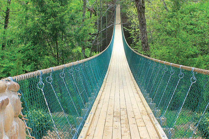 Sevierville, Tennessee, is home to the world’s longest swinging bridge.