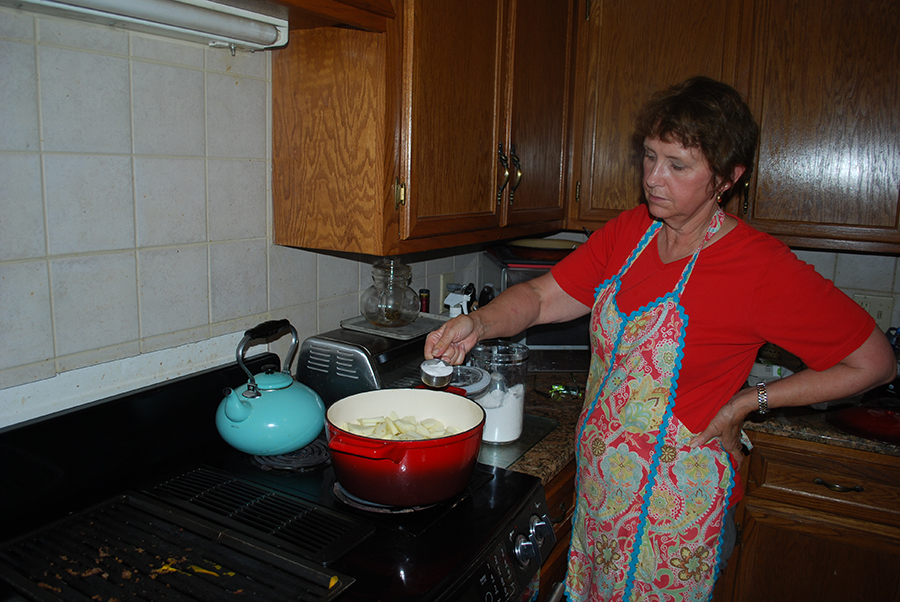 Elaine cooking Simple Stovetop Summer Rambos with Sugar and Cinnamon.
