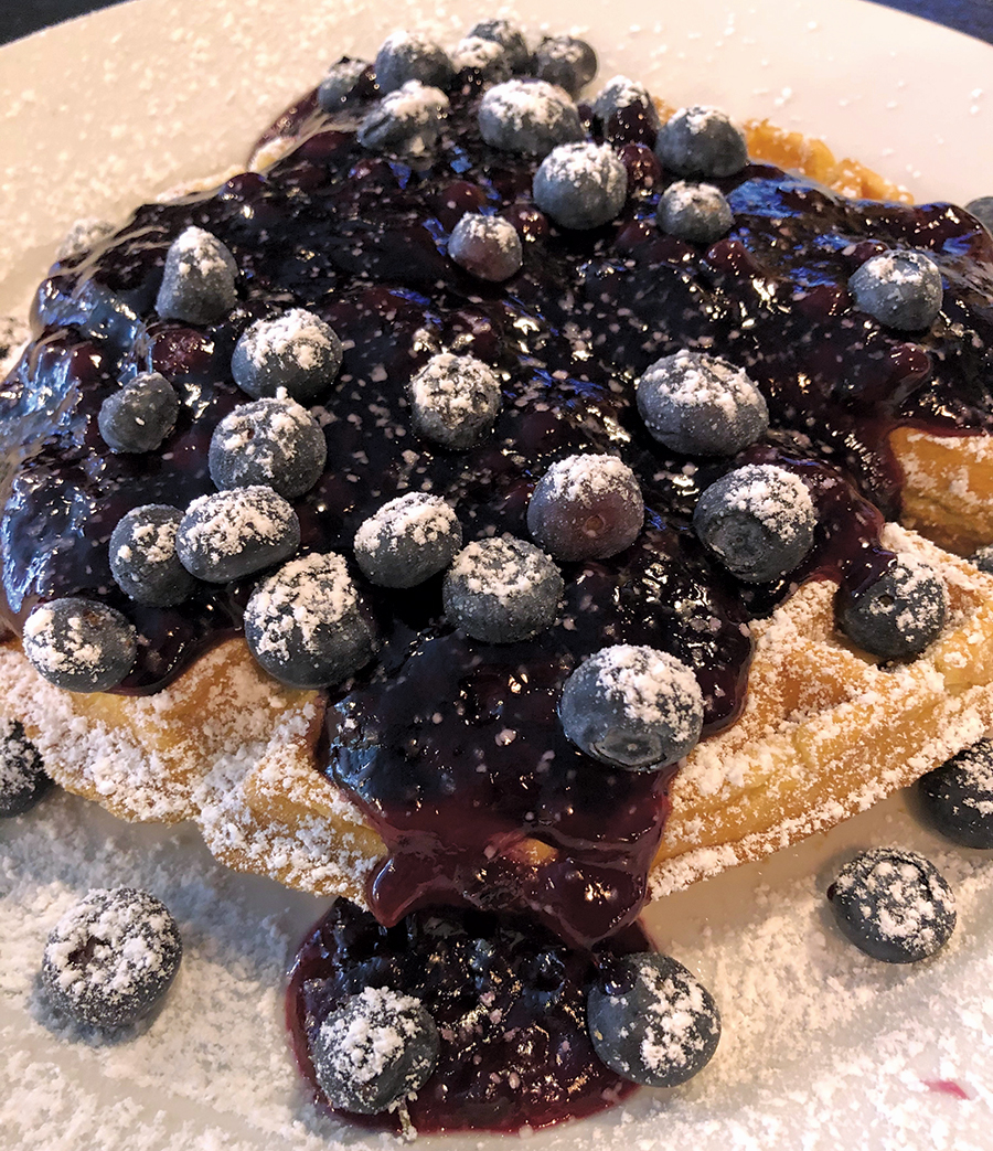 Heritage Kitchen’s Belgian waffles are topped with blueberry compote.