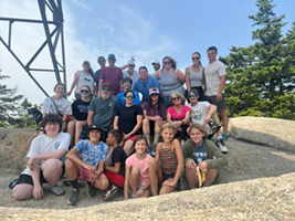 The family pauses at the top of Bald Knob, Acadia National Park, Maine, July 27