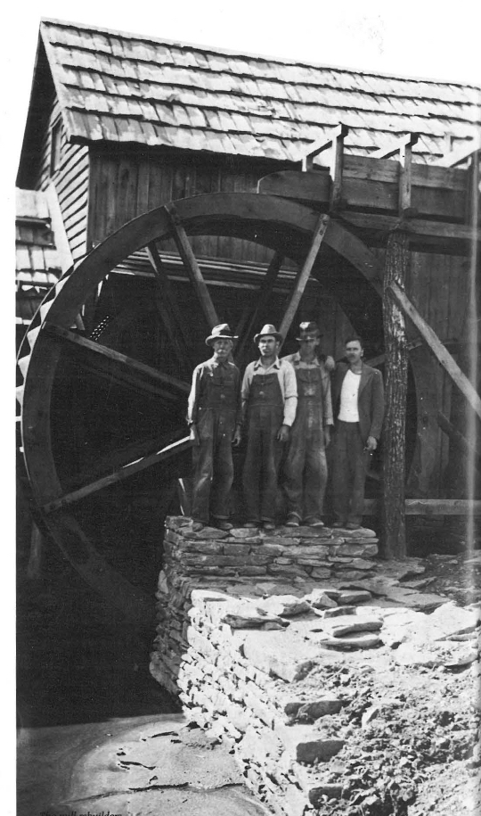 While World War II raged, they restored the mill. From left: A.N. Hylton, C.A. Goad, Scott, Ken McCarter.