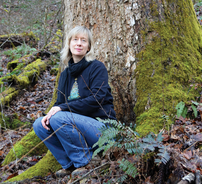 Ellen Honeycutt relaxes in a old-growth forest in North Georgia.