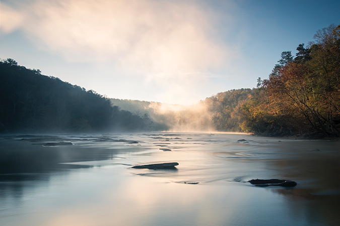 Crisp Fall mornings often mean rising fog off of the calm sections of the Chattahoochee River in North Georgia.