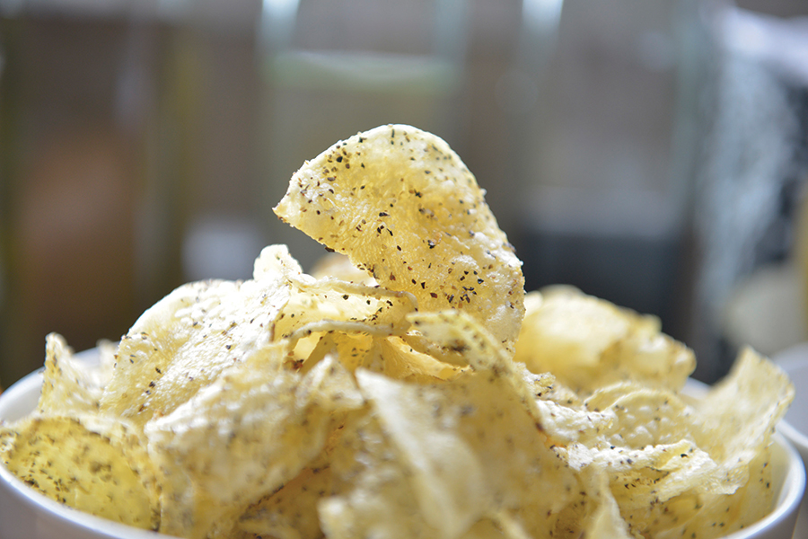 Large flakes of cracked black pepper season Route 11 Salt & Pepper Chips.