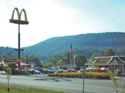 The company's former lumberyard is now home to fast food restaurants; a shopping center, bank and armory occupy the land where the mill stood.