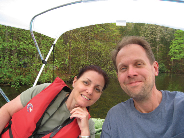 Beverly Lynn Stepp and Doug Rener cruise  in a paddleboat.