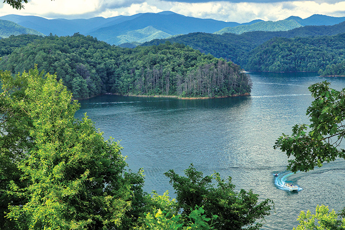 Fontana Lake is the largest lake in Western North Carolina, and is surrounded by the Great Smoky Mountains.