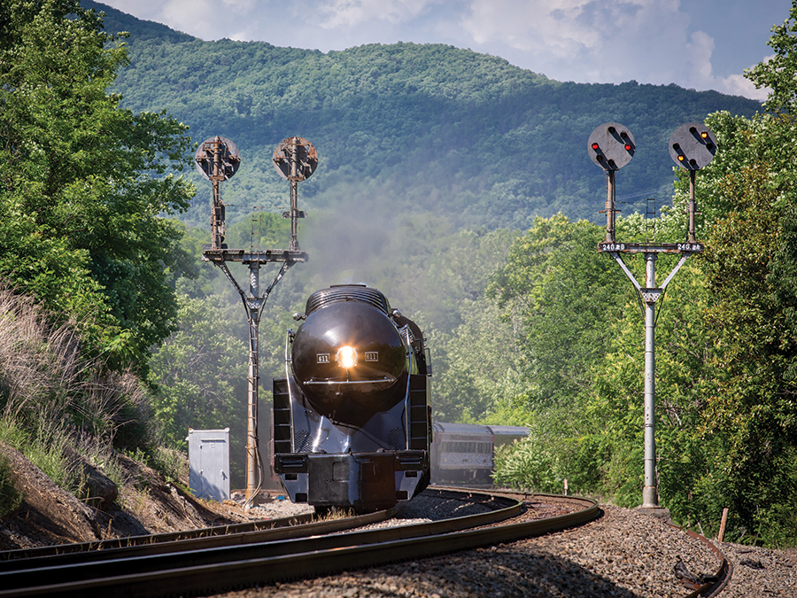The recently restored Norfolk & Western #611 rolls through Blue Ridge, Virginia, pulling an excursion sponsored by the Virginia Museum of Transportation.