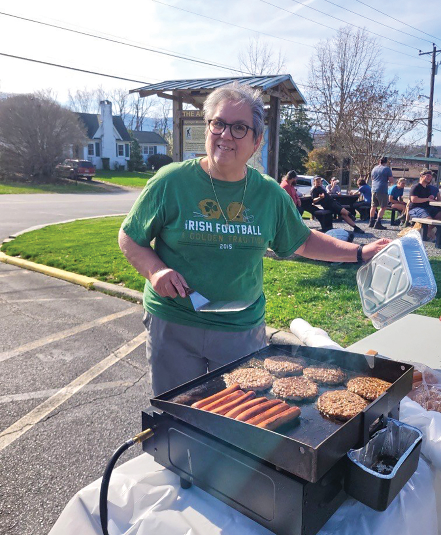 Hiawassee Mayor Liz Ordiales grills hamburgers and hotdogs for Appalachian Trail hikers during peak season.