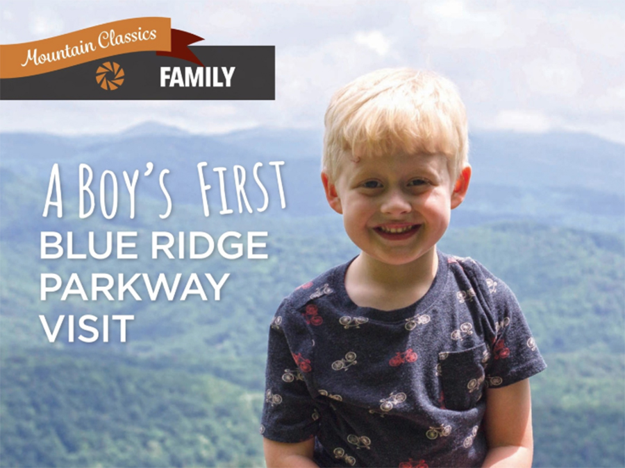 Kayden grins at Jumpinoff Rock Overlook in Glendale Springs, North Carolina, along the parkway.