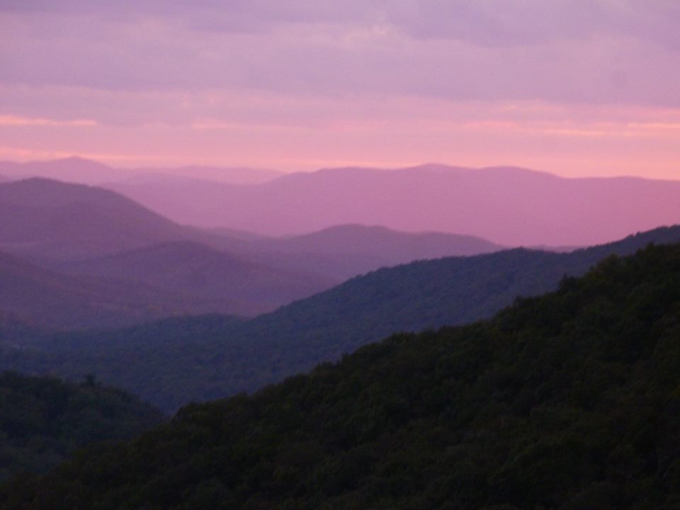 My sister and I went up to stay in the Shenandoah Natl Park last Sept. On the way in I took this iconic pic of the area's sunset. No editing required.