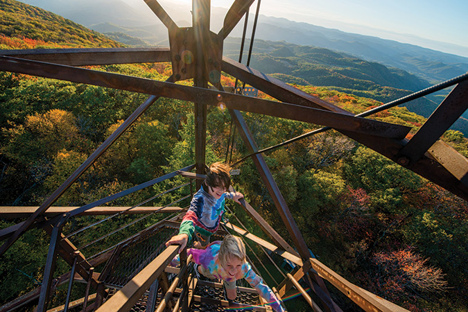 Amid the splendor of autumn in Southern Appalachia and with excited curiosity, Ellic (photographer’s son) and Oscar (the accompanying videographer’s son)climb the steep stairs of the Olson Observation Tower in West Virginia’s Monongahela National Forest.