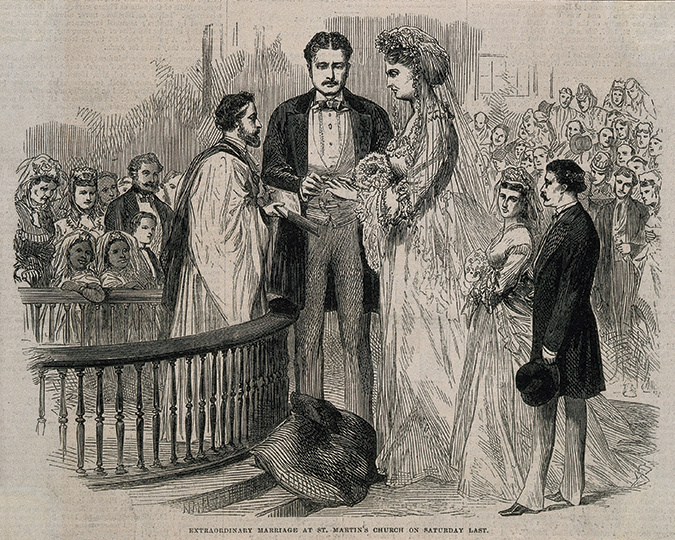 According to press accounts of the 1871 wedding, “the bride’s dress became her well. . . ” And, “Captain Bates, the bridegroom, may be pardoned for having looked rather less at ease in a blue coat, white waistcoat and grey or light-tinted trousers.”