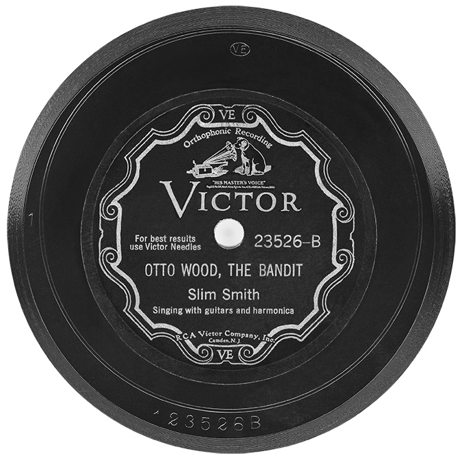 “Otto Wood, The Bandit,” by Bernard “Slim” Smith of Mississippi. The backing band included a Hawaiian steel guitarist; likely the only old Appalachian ballad that lends itself to Hula dancing.