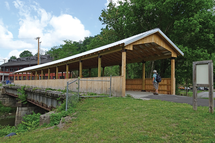 The trail’s covered bridge was dedicated in 2021.