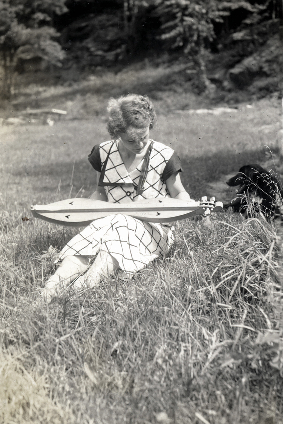 The focus on music at Pine Mountain included the collection of ballads and folksongs. Here, Barbara Faulkner, PMSS   staff member 1932-’37, plays the dulcimer.