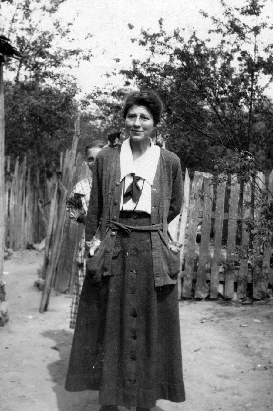 Dr. Grace Huse, here with kittens in her pockets and on her shoulders, came to Pine Mountain in 1919 and stayed for five years as a doctor at the Medical Settlement at Big Laurel.
